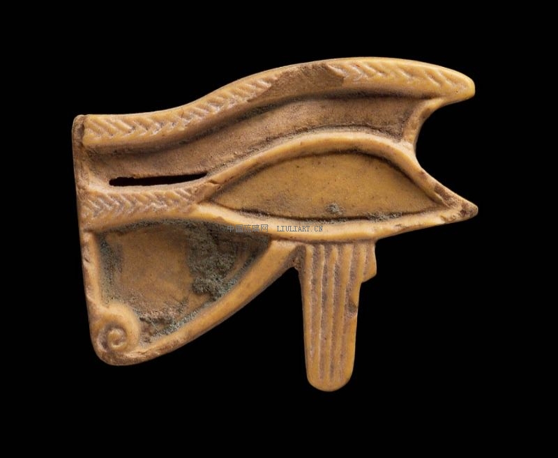 Eye of Horus (wedjat) amulet_Yellow faience.jpg